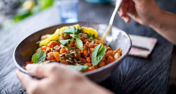 person eating a vegetarian meal